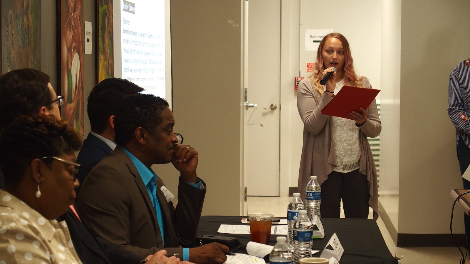 Emily Chambers, an English as a Second Language teacher at Cordova High School, asks school officials to ensure report cards can be translated into Spanish next school year.