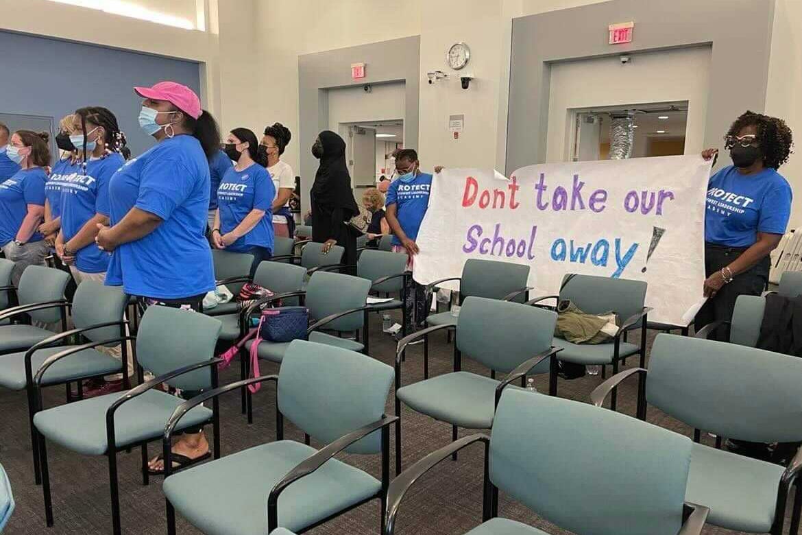 Student, educators and families of Southwest Leadership Academy Charter School stand in protest.