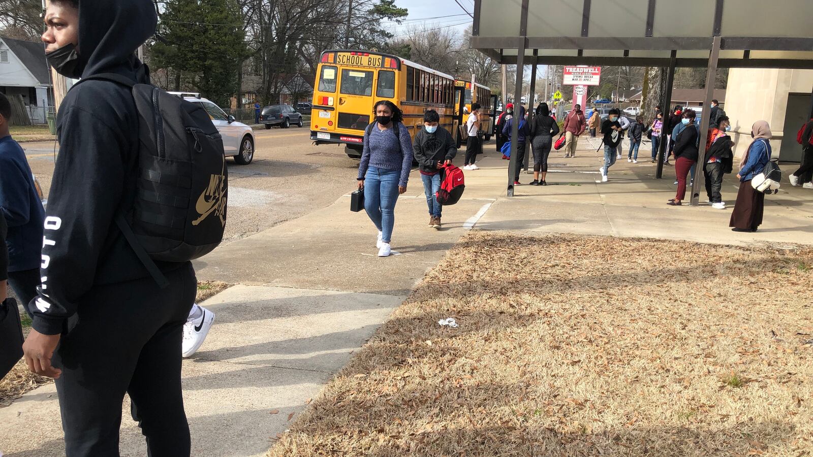 Students leave school for the day following afternoon dismissal.