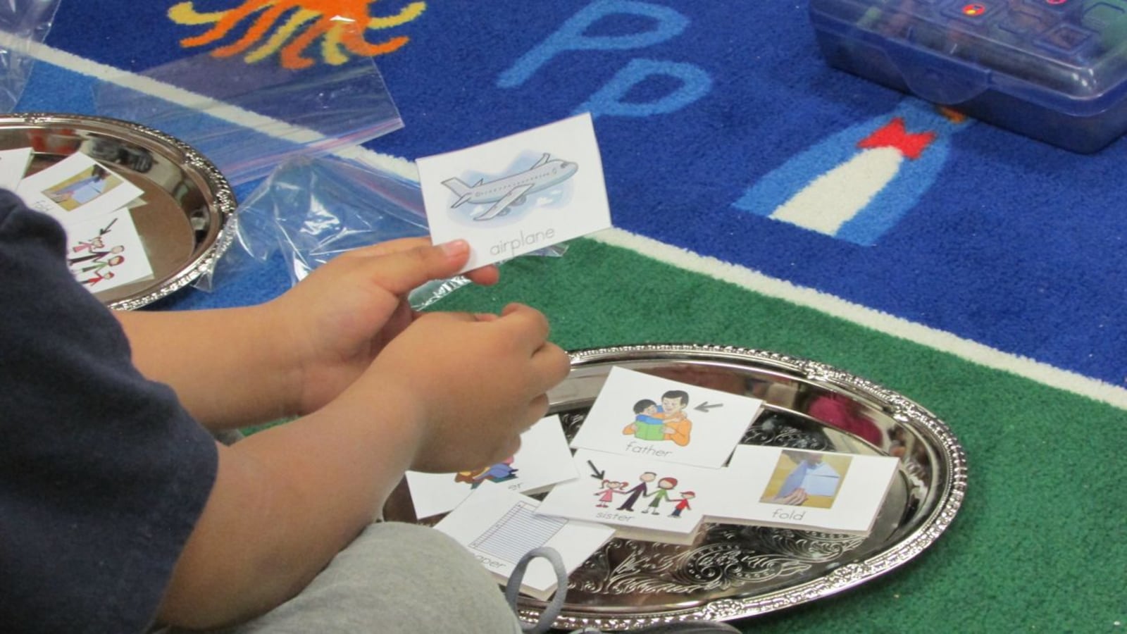 In a first grade class at Nora Elementary School in Washington Township, English language learners use pictures to match to English words.