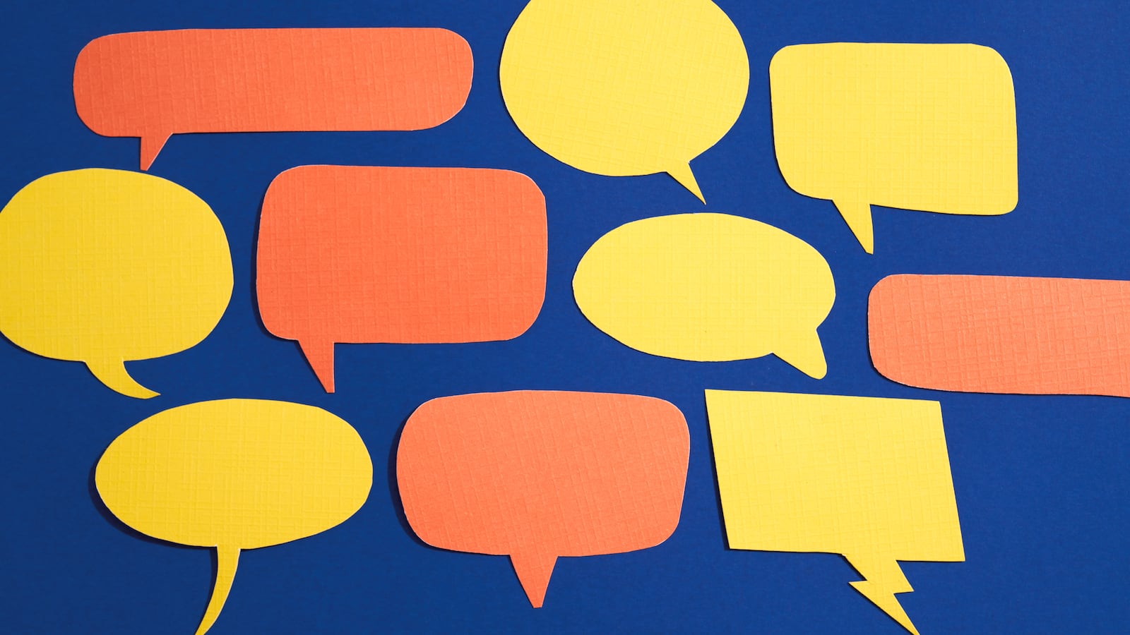 A blue background with yellow and orange speech bubbles