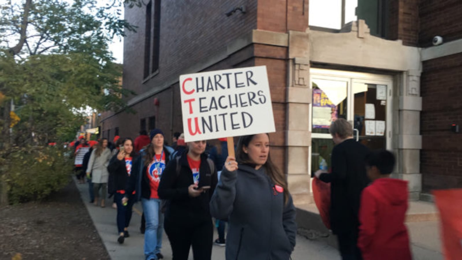 Members of the Chicago Alliance of Charter Teachers and Staff protest before an Acero network board meeting in October.