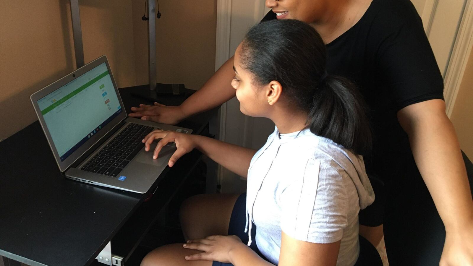 Christine Madhere, a parent leader at Manhattan’s School for Global Leaders, with her daughter, Jadeyn.