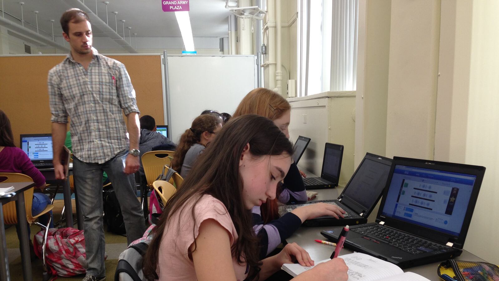 A student at I.S. 228 in Brooklyn does online work through Teach to One, a program that grew out of the iZone.