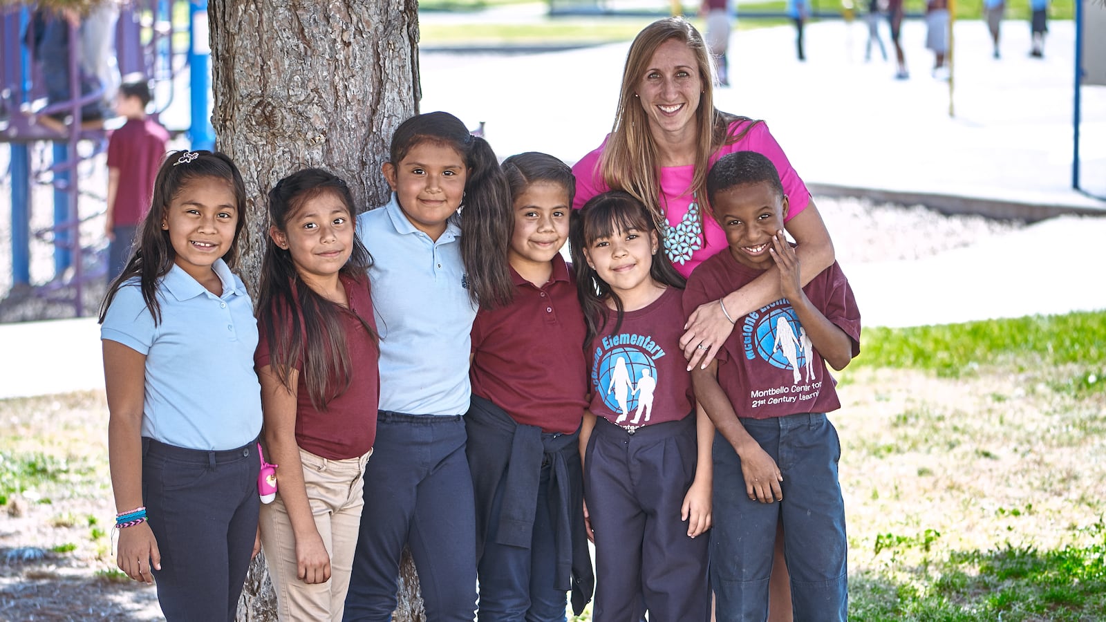McGlone principal Sara Gips Goodall and some of her students.
