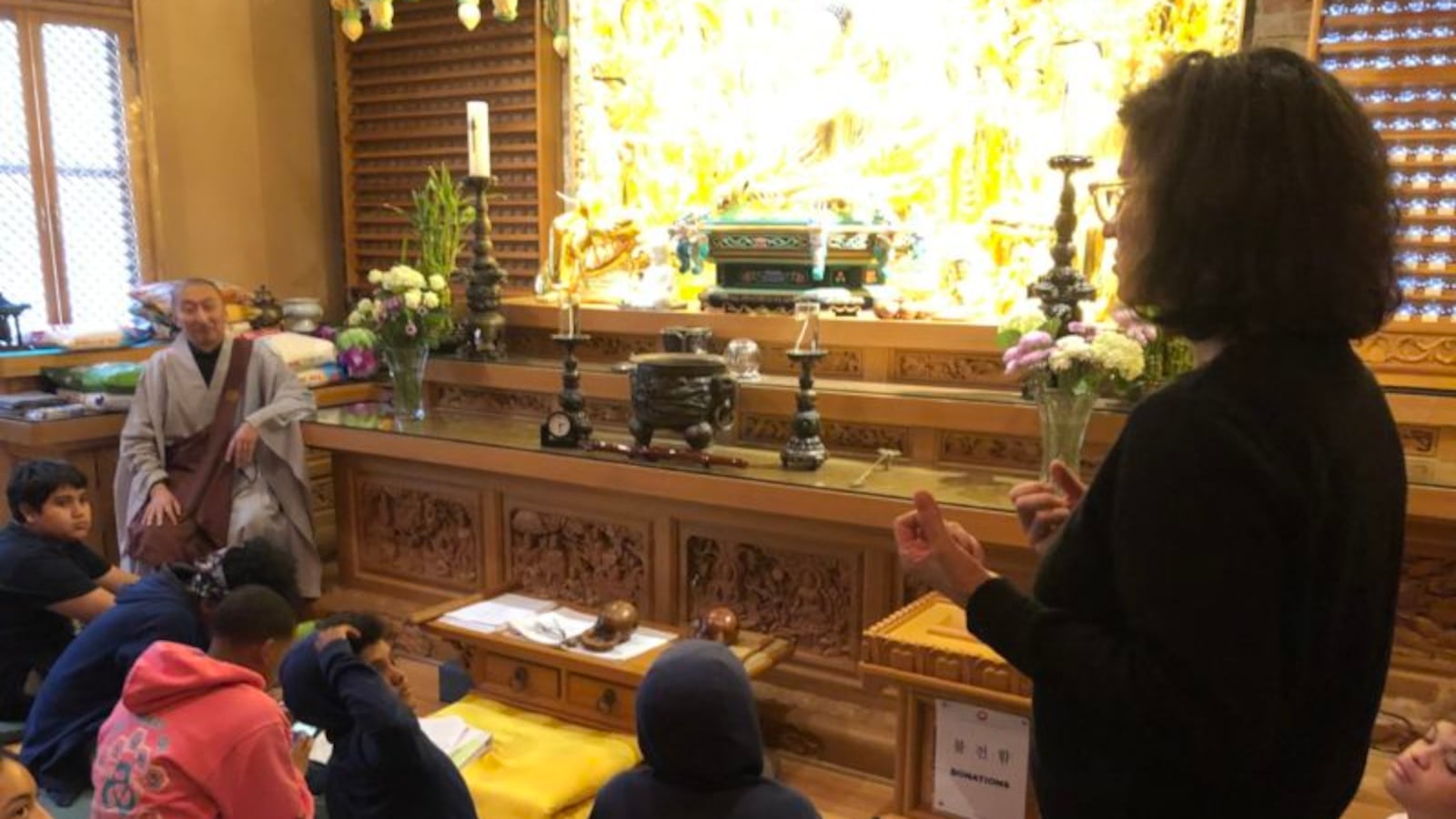 Jody Madell and her ninth-grade students at Chogyesa Zen Temple of New York.