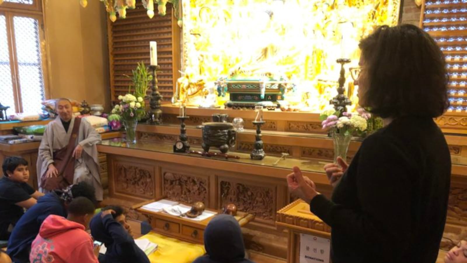 Jody Madell and her ninth-grade students at Chogyesa Zen Temple of New York.