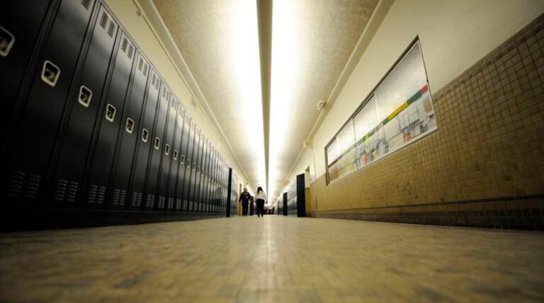 Grade-fixing charges dropped against Dewey HS principal who was removed from school