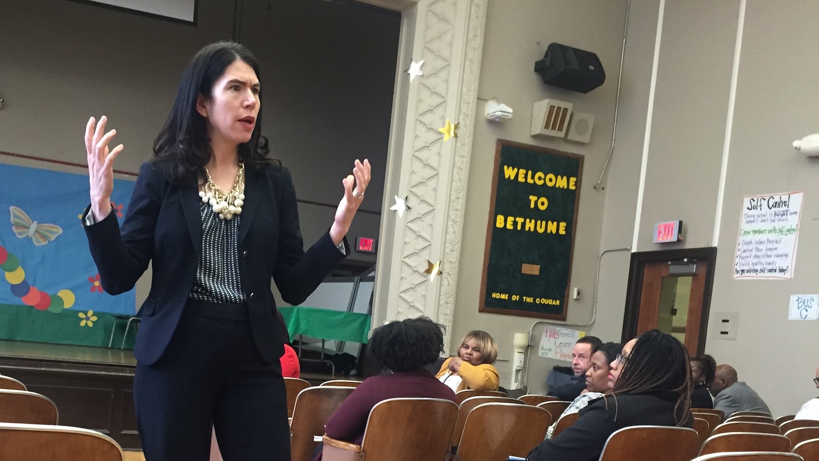 Interim Superintendent Alycia Meriweather addresses parents and teachers at Bethune Elementary-Middle School on Detroit's west side about the school's return to the district.