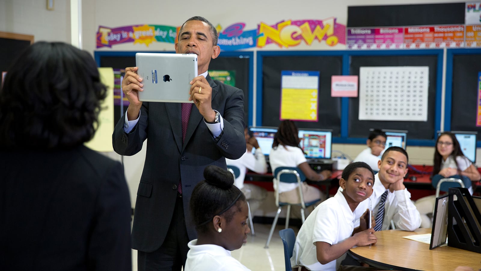 President Barack Obama using an iPad while visiting a classroom in Maryland in February.