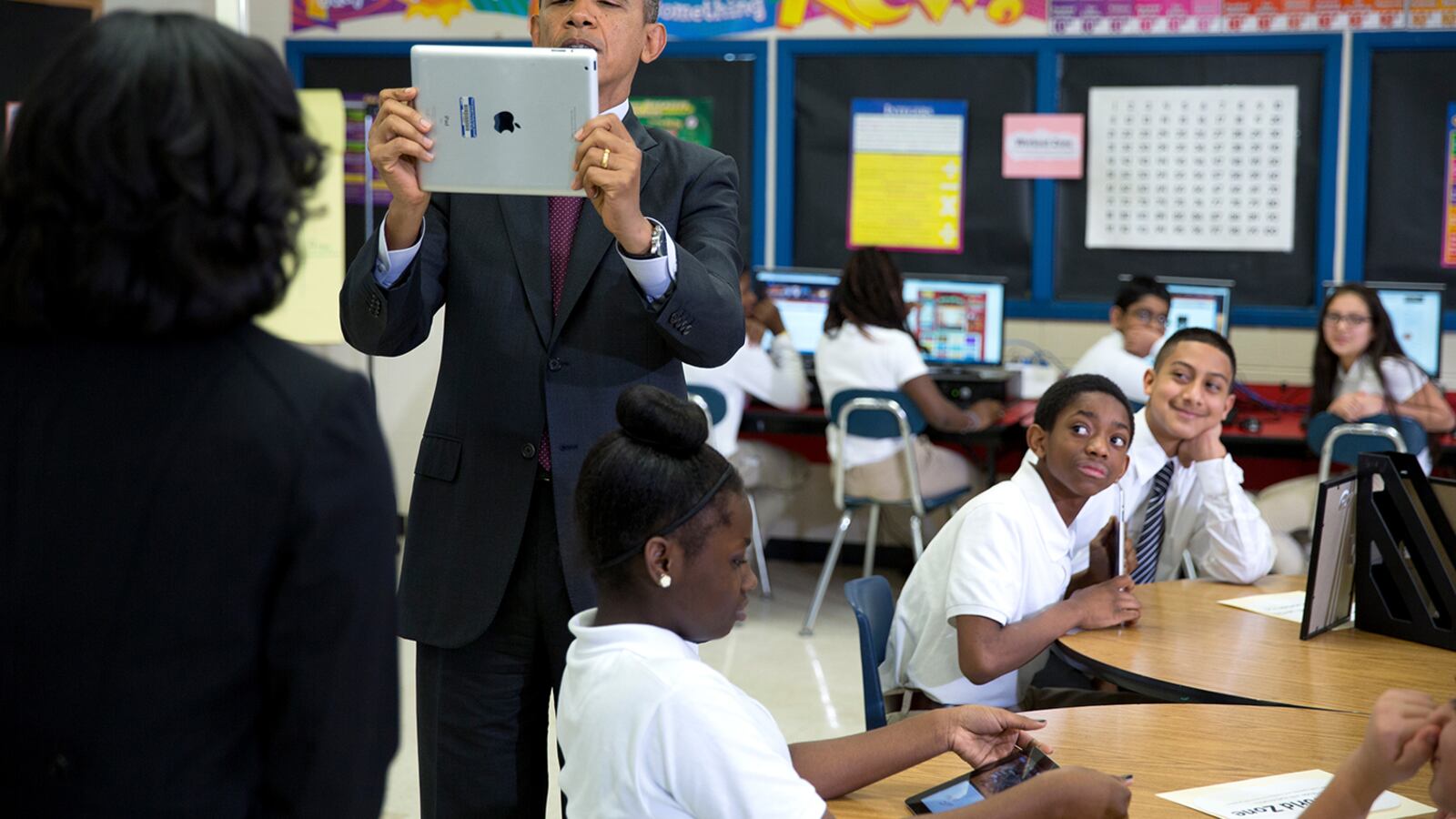 President Barack Obama using an iPad while visiting a classroom in Maryland in February.