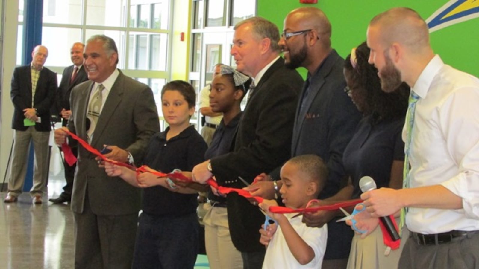 Then-Mayor Greg Ballard helps cut the ribbon for the opening of Vision Academy in 2014. Like many new charter schools, it had low test scores in its first year.
