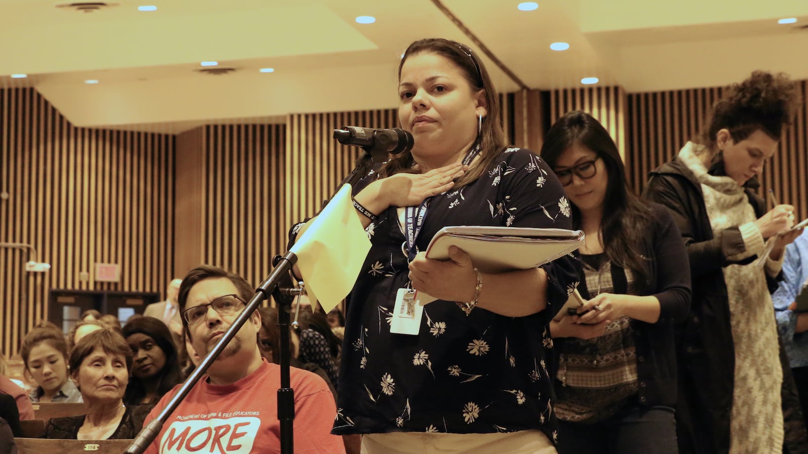 Teacher Aixa Rodriguez speaks at a Panel for Educational Policy meeting in 2016.