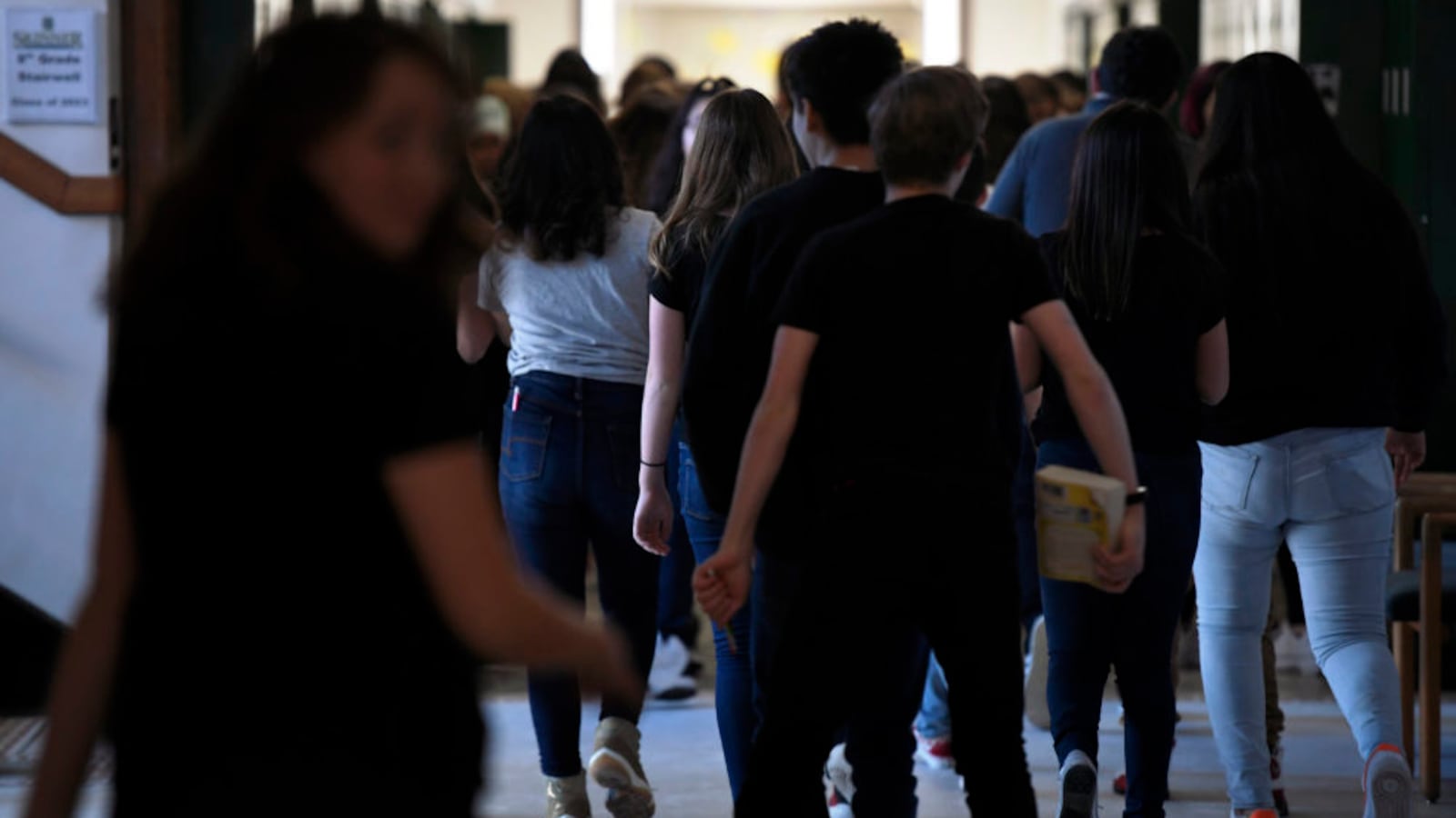 Students head to the cafeteria at Skinner Middle School during the first day of the Denver teacher strike.