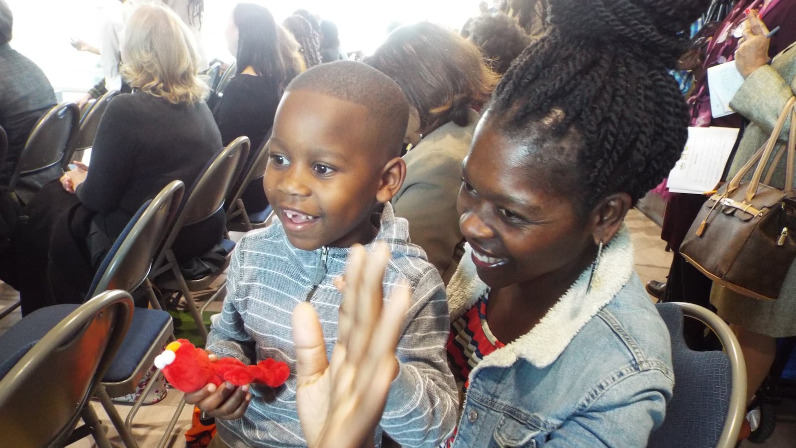 Five-year-old Tailor Jackson can barely stay in his mother's lap when Elmo enters the room. The furry, red-haired monster was on hand Tuesday as early education leaders in Memphis announced a new partnership with Sesame Street in Communities.
