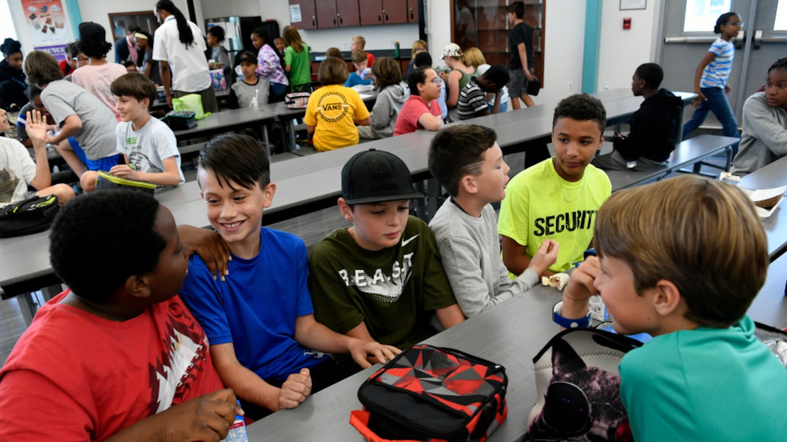 Students eat lunch at Denver Green School Northfield. The schools is in an enrollment zone.