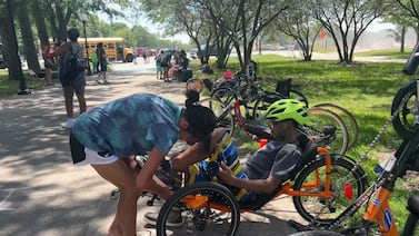 Young people with physical disabilities swim, bike, and run at Chicago summer camp