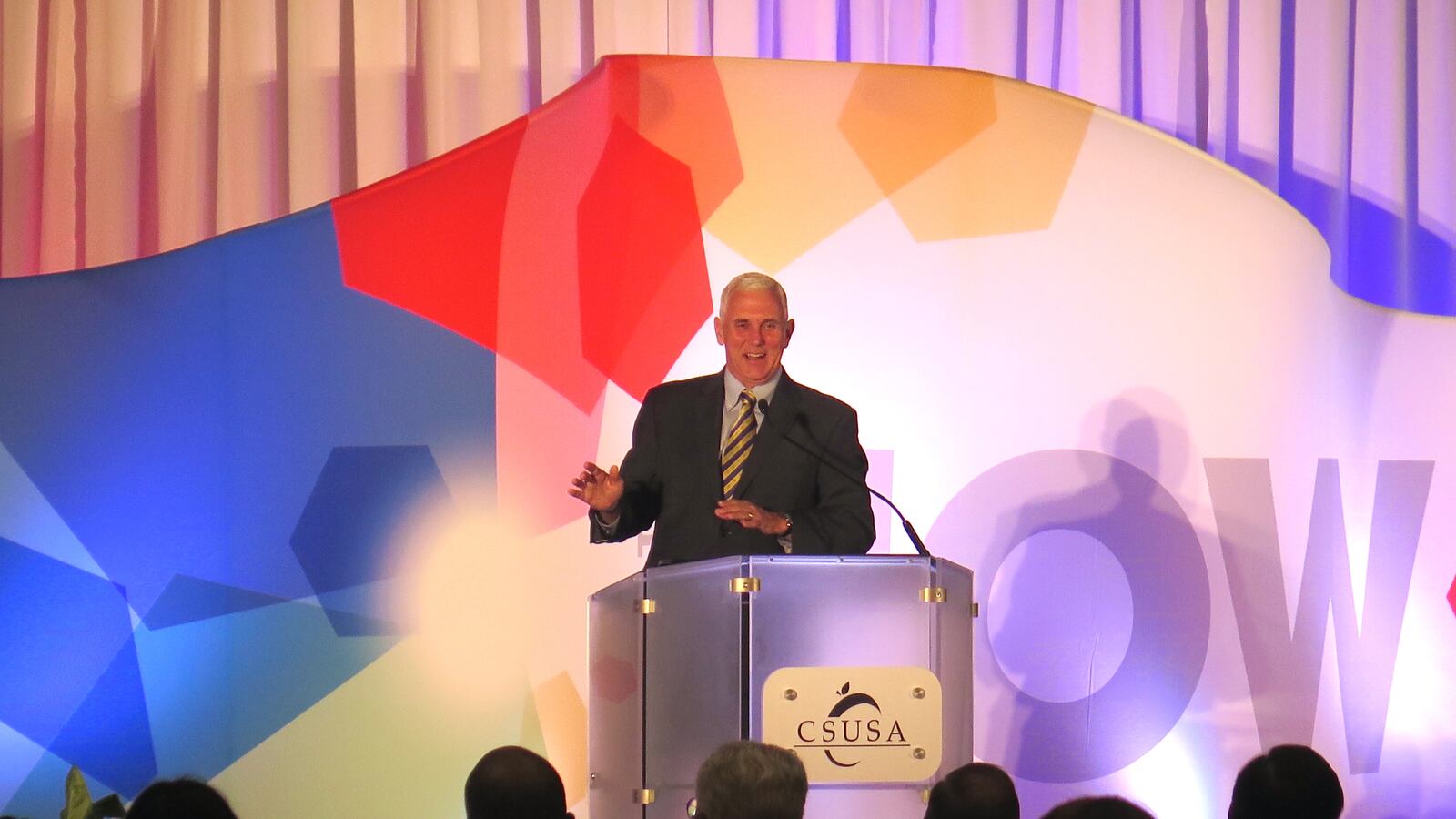 Gov. Mike Pence addresses a crowd of teachers and leaders from Howe and Manual high schools and Donnan, which is now a K-8 school, during Charter Schools USA's annual summit at the Westin Hotel downtown.