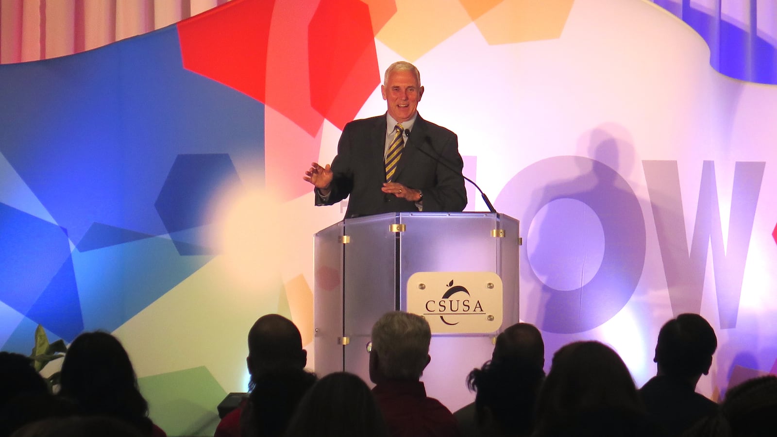 Gov. Mike Pence addresses a crowd of teachers and leaders from Howe and Manual high schools and Donnan, which is now a K-8 school, during Charter Schools USA's annual summit at the Westin Hotel downtown.