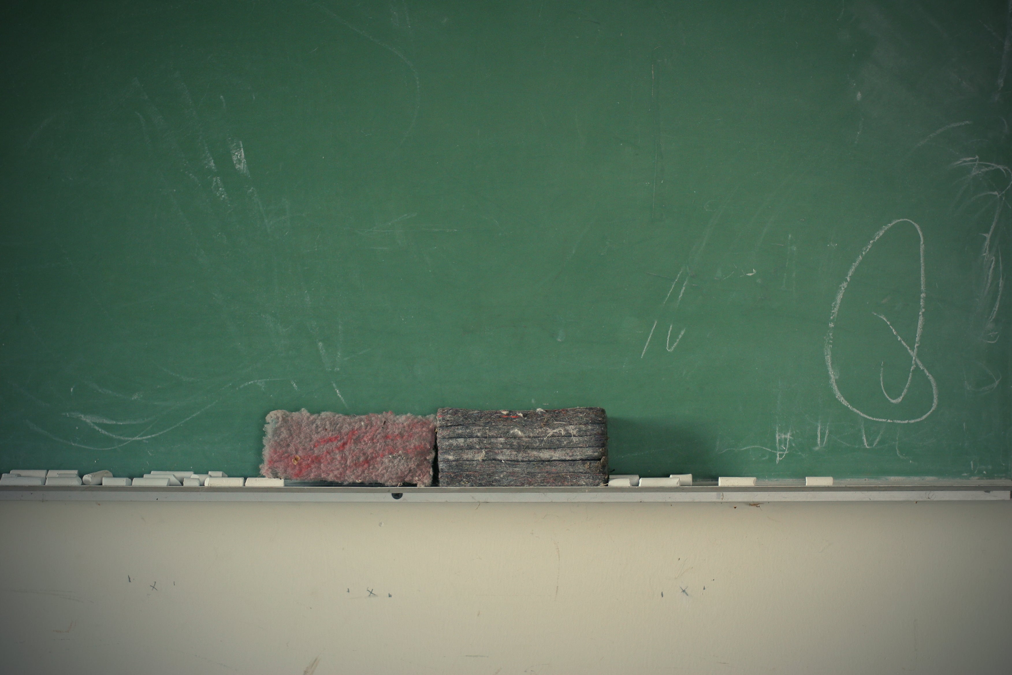 Erasers and a chalkboard.