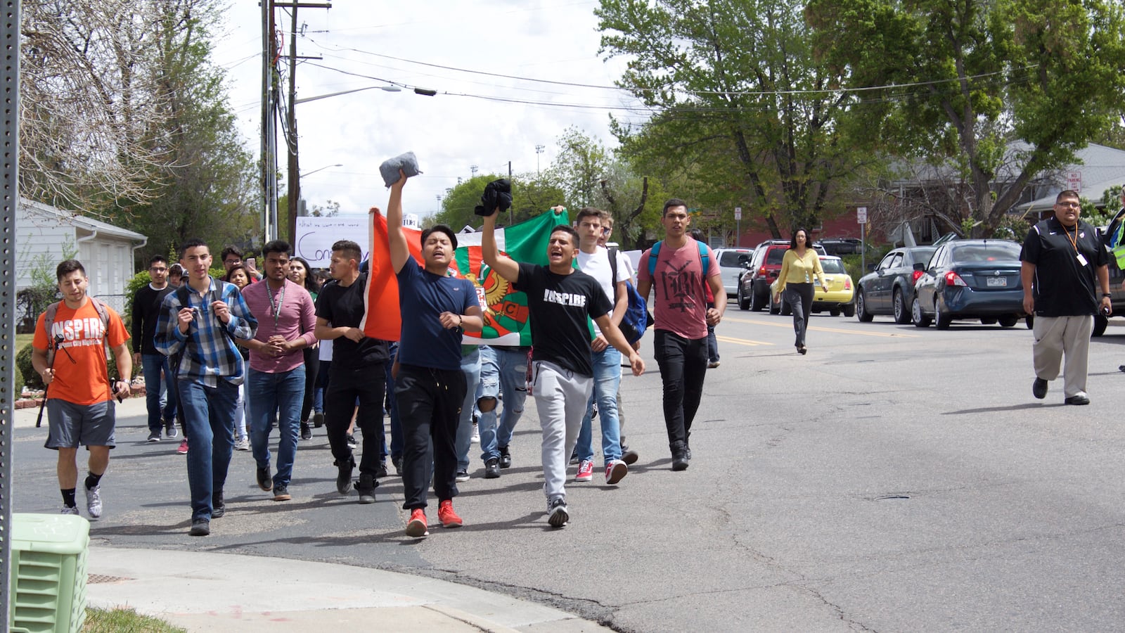 Students from Adams City High School march toward the district building April 25, 2017. (Photo by Yesenia Robles, Chalkbeat)