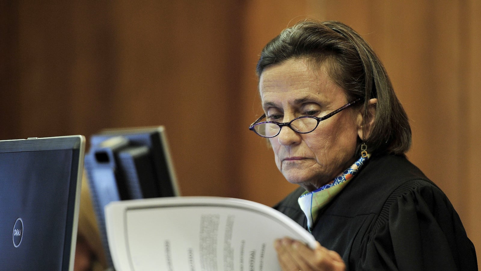 Chancellor Claudia Bonnyman looks over evidence during a 2015 trial. The Nashville judge is presiding over a school funding lawsuit that pits Tennessee's two largest districts against the state.