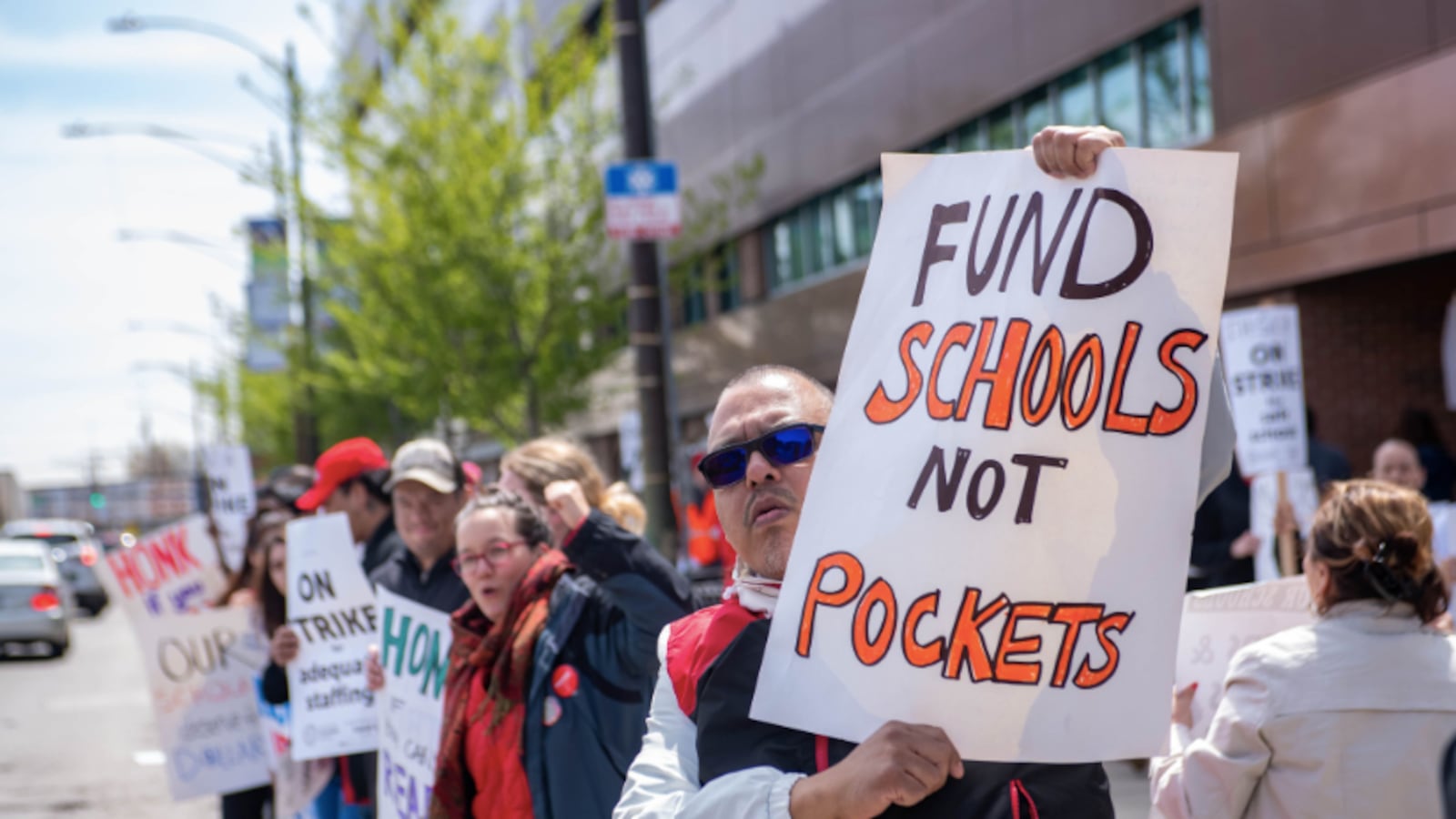 Teachers and supporters rally during Chicago's third charter teacher strike this school year.