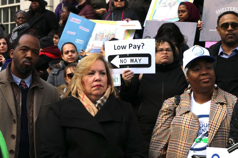 Kim Medina, the head of District Council 1707, speaks at a rally at City Hall to demand that pre-K teachers in community organizations are paid equally to education department teachers on March 20, 2019.