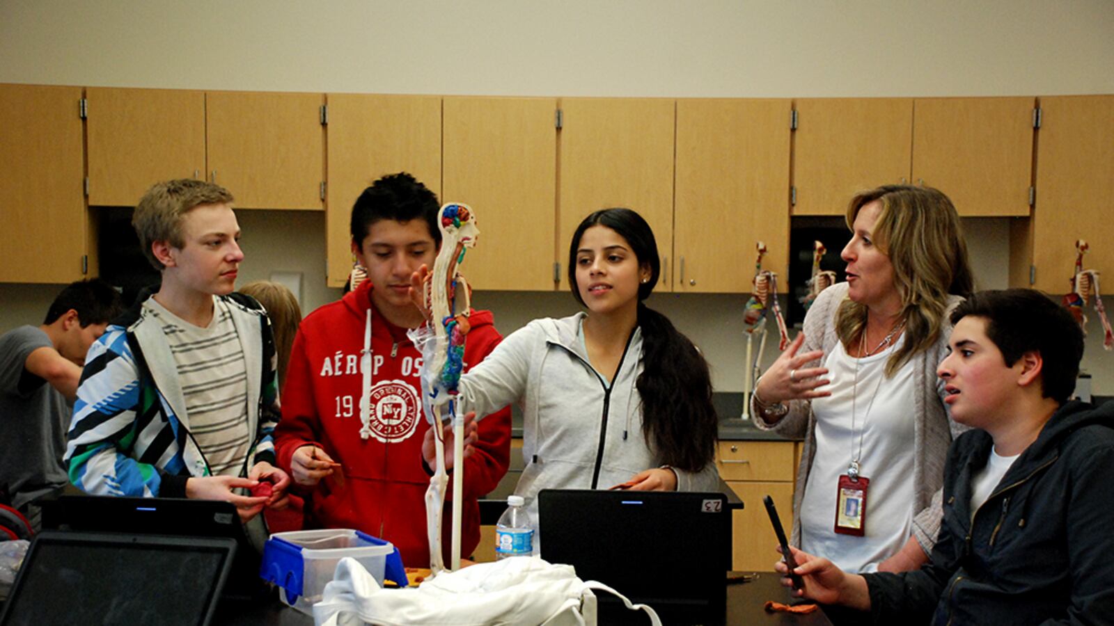 Students at Northglenn High School who are studying biomedical science work on an assignment.