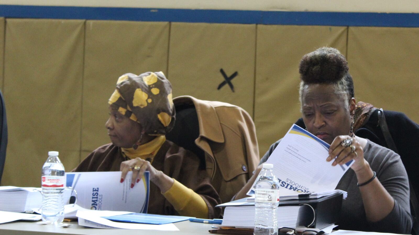 Members of the board of the Highland Park Public Schools Academy opened bids from management companies last week. The district's only building, a charter school, is currently run by The Leona Group.