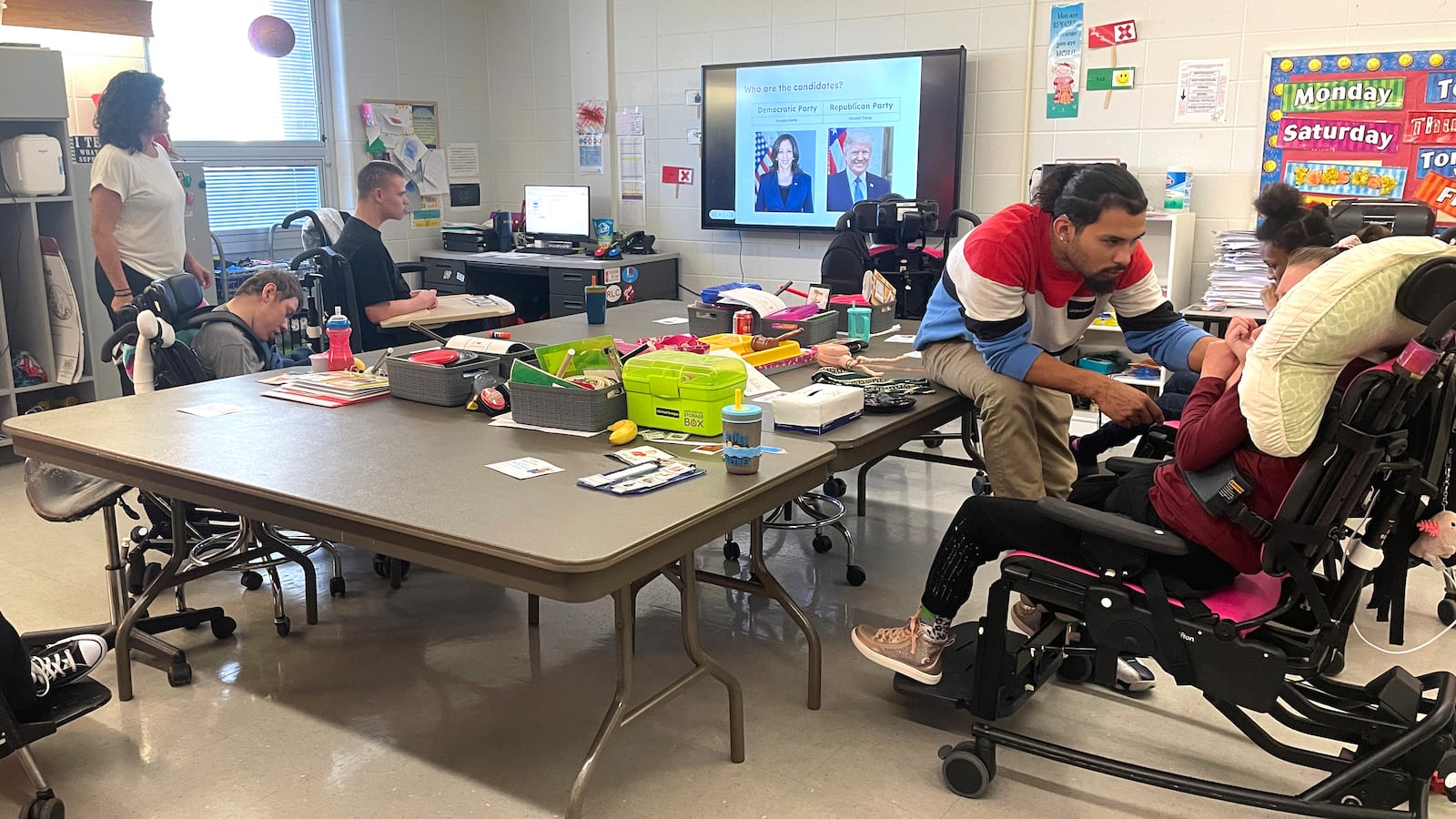 A group of students and teachers in a classroom.