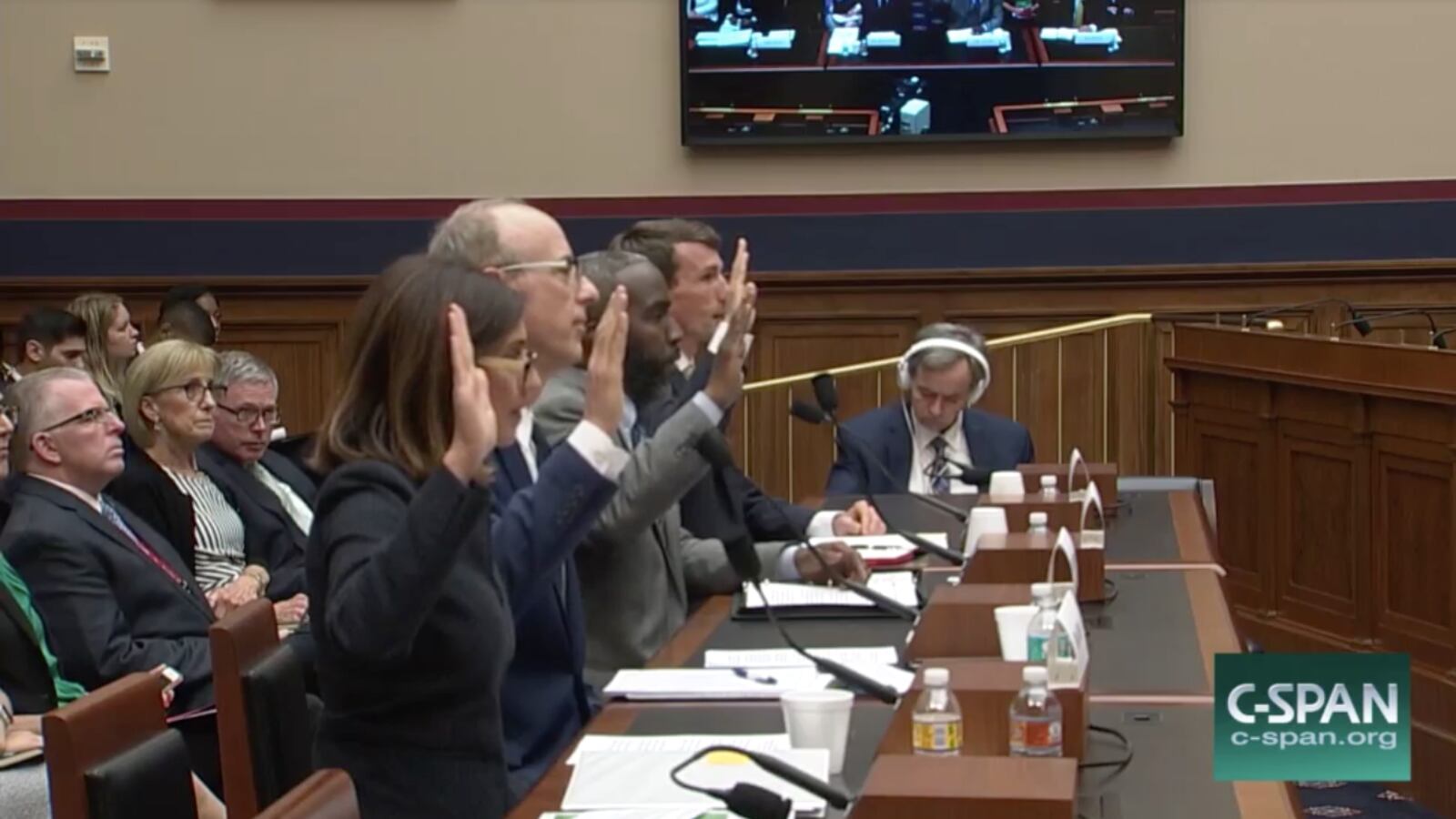 Witnesses at the U.S. House hearing on charter schools are sworn in near. From nearest on: Nina Rees of the National Alliance for Public Charter Schools; Greg Richmond of the National Association of Charter School Authorizers; Jonathon Clark, of 482Forward; and Marty West of Harvard University.
