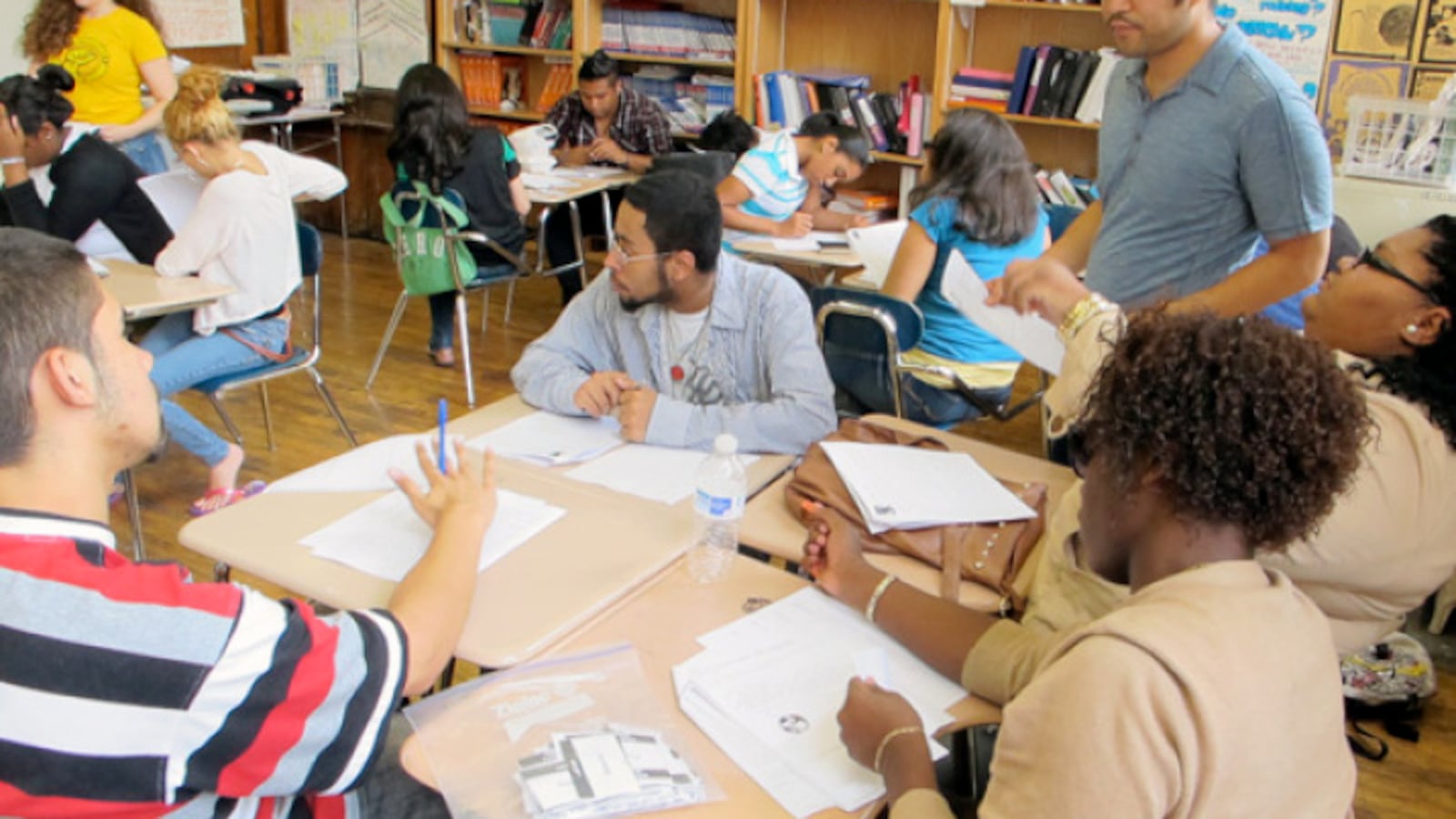 A social studies class at New Design High School, where Scott Conti is principal