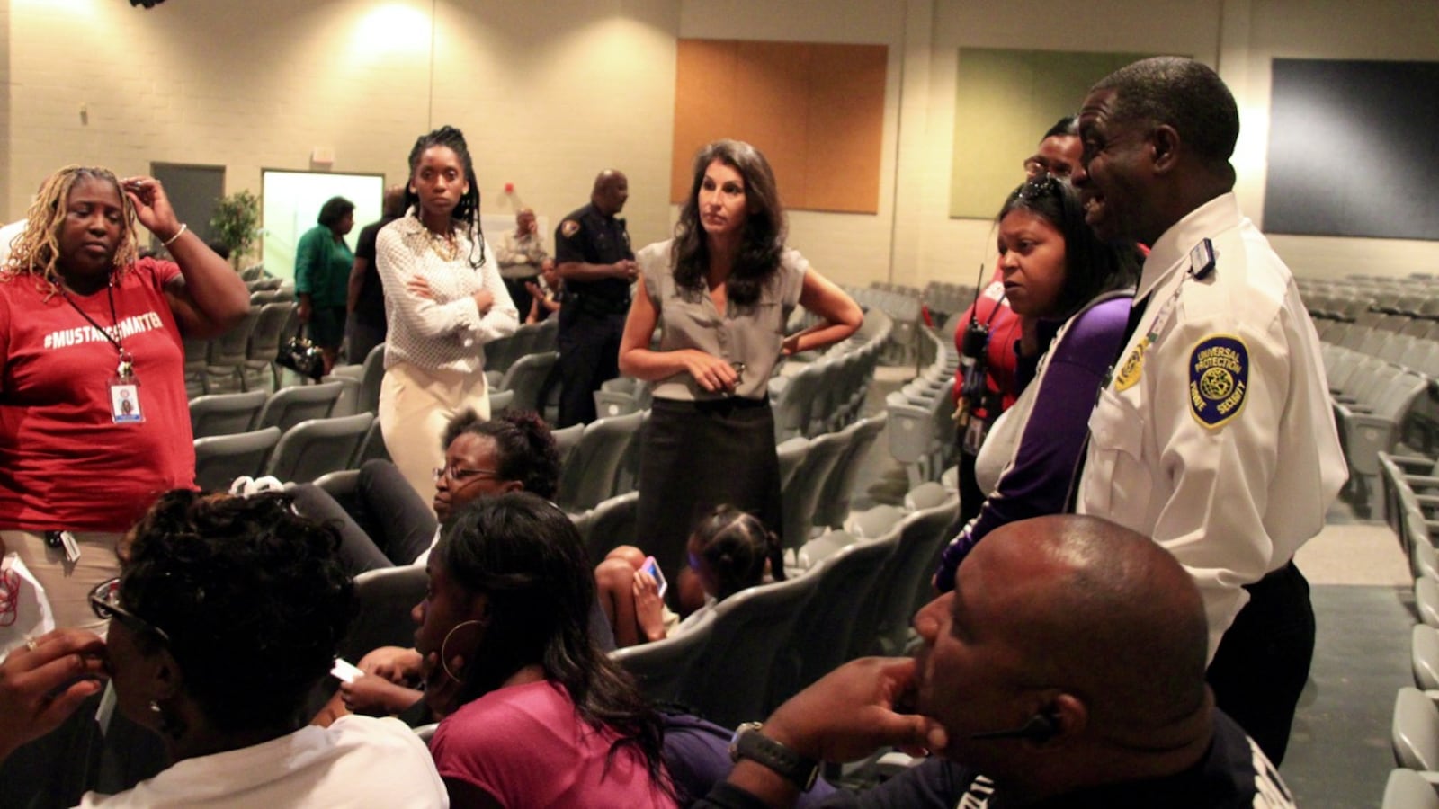 East High School teachers and alumni talk with Chief Academic Officer Heidi Ramirez (center) about the Memphis school's future.