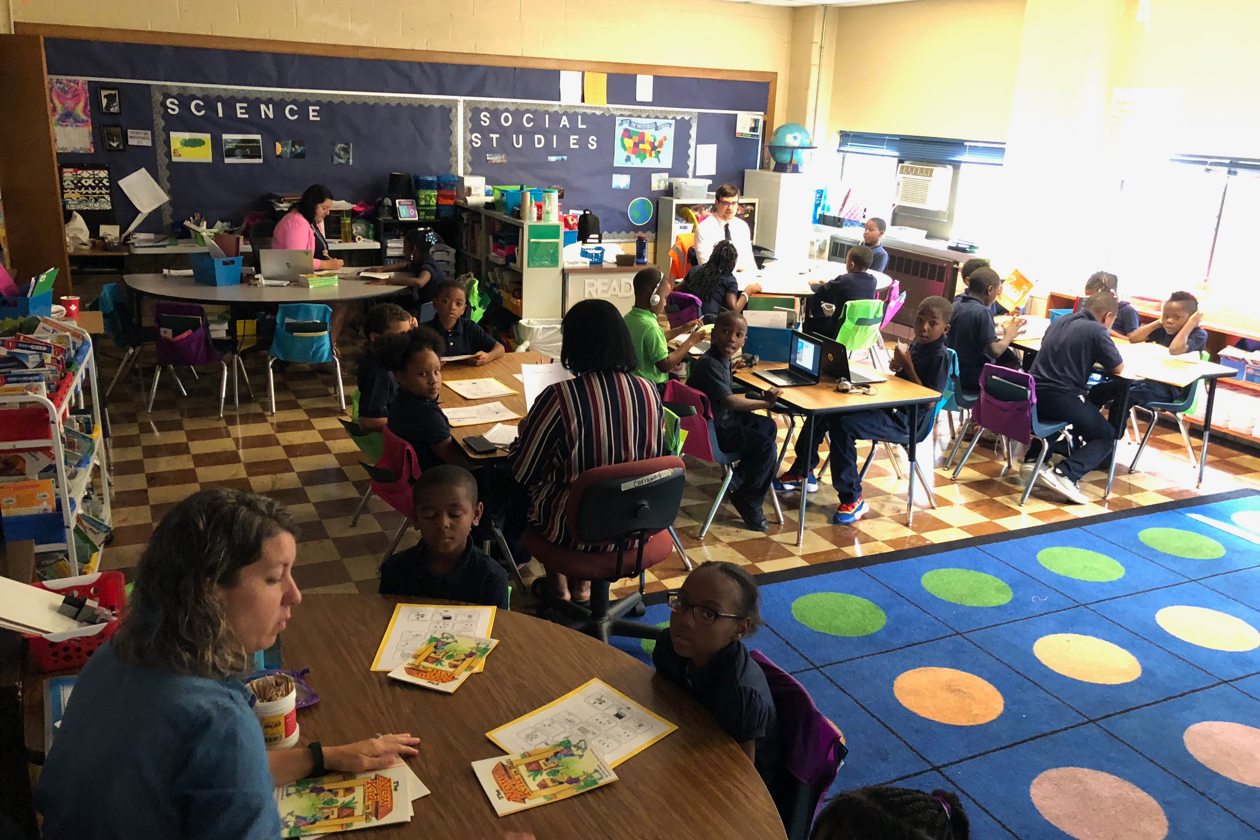 The third-grade classroom for struggling readers at Detroit Premier Academy was divided into stations.