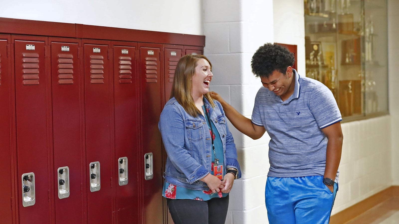 Jessika Osborne, ESL coordinator and Title 3 Coordinator for Manual High School, left, talks with Lester at Emmerich Manual High School, Monday, July 31, 2018. Lester moved to Indianapolis when he was 15 years old and is set to graduate from Manual in 2019.  Lester, an undocumented immigrant from Honduras, dreams of going to college.  He hopes that football will help him pay for that dream.