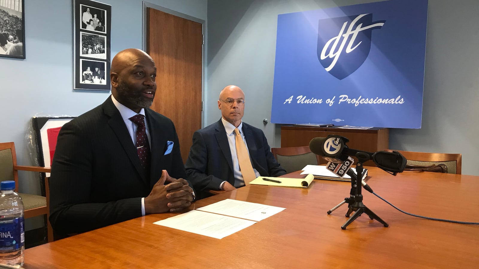 Terrence Martin, left, president of the Detroit Federation of Teachers, announced a tentative salary agreement Tuesday morning.