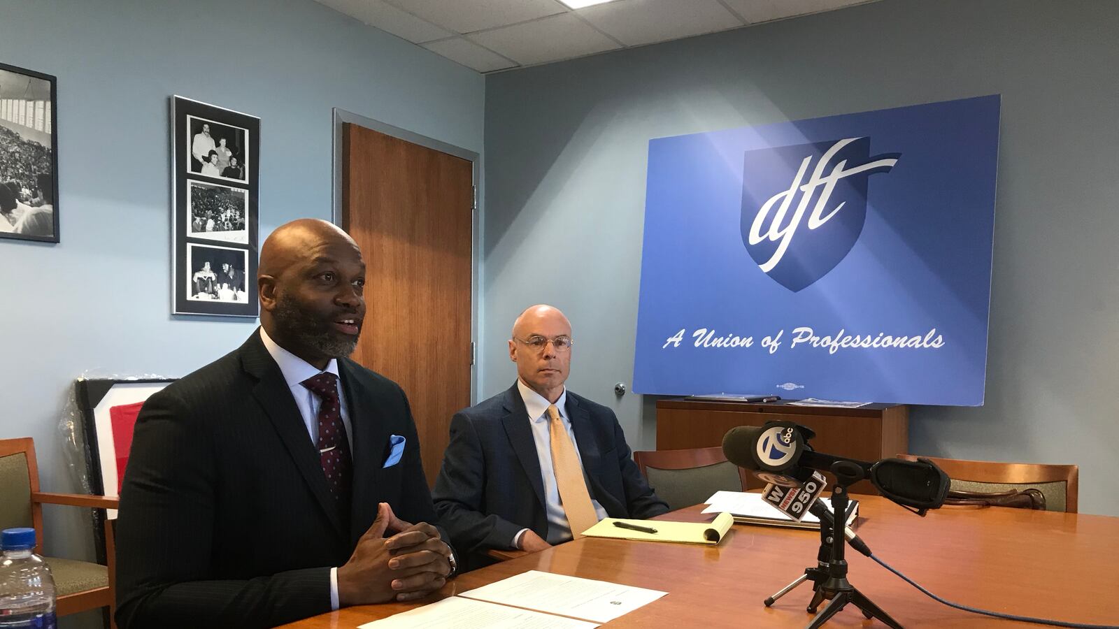 Terrence Martin, left, president of the Detroit Federation of Teachers, announced a tentative salary agreement Tuesday morning.