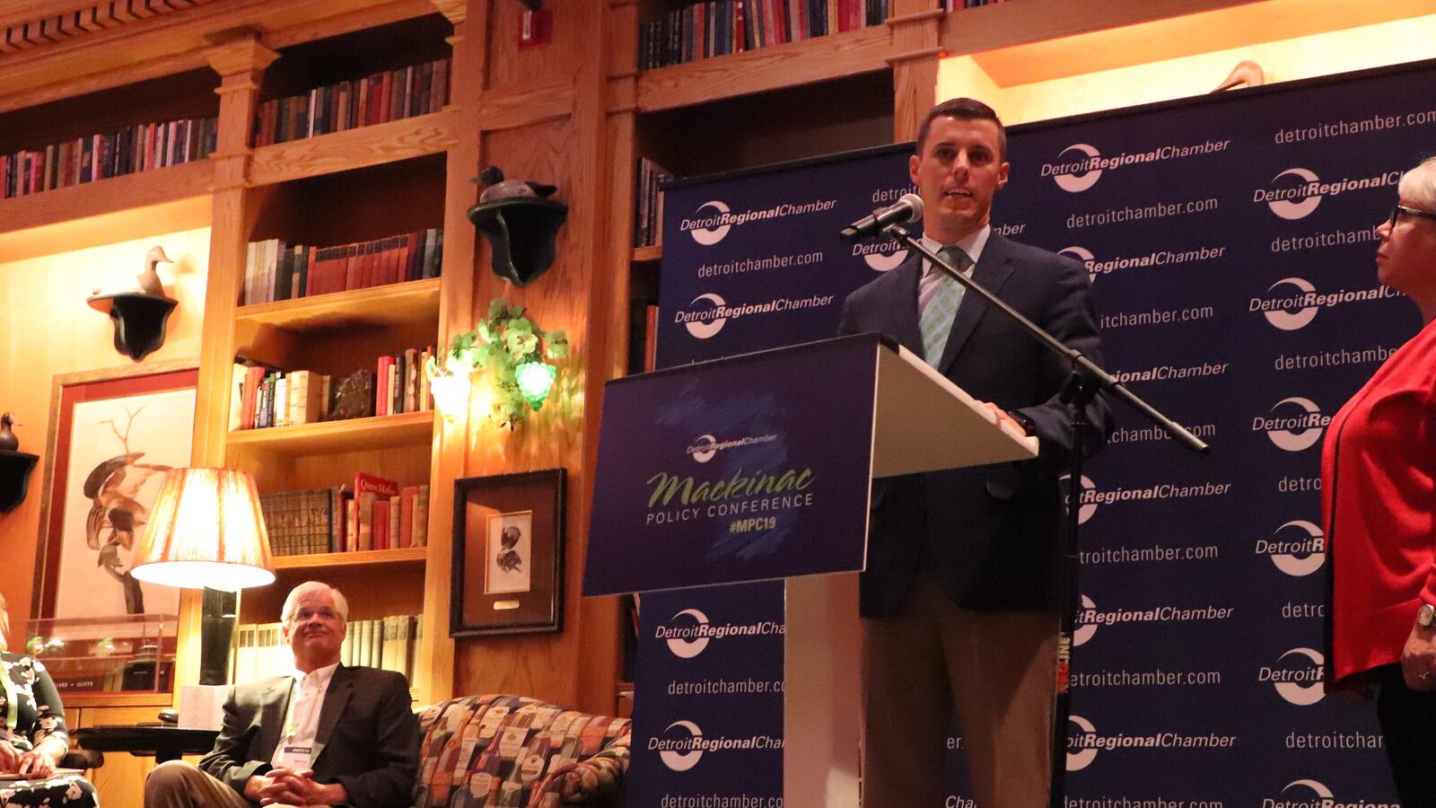 Lee Chatfield, Republican speaker of the Michigan House, addresses reporters at a press conference for Launch Michigan. Also present were Paula Herbart, president of the Michigan Education Association (right) and Mike Shirkey (left), Republican Senate majority leader.