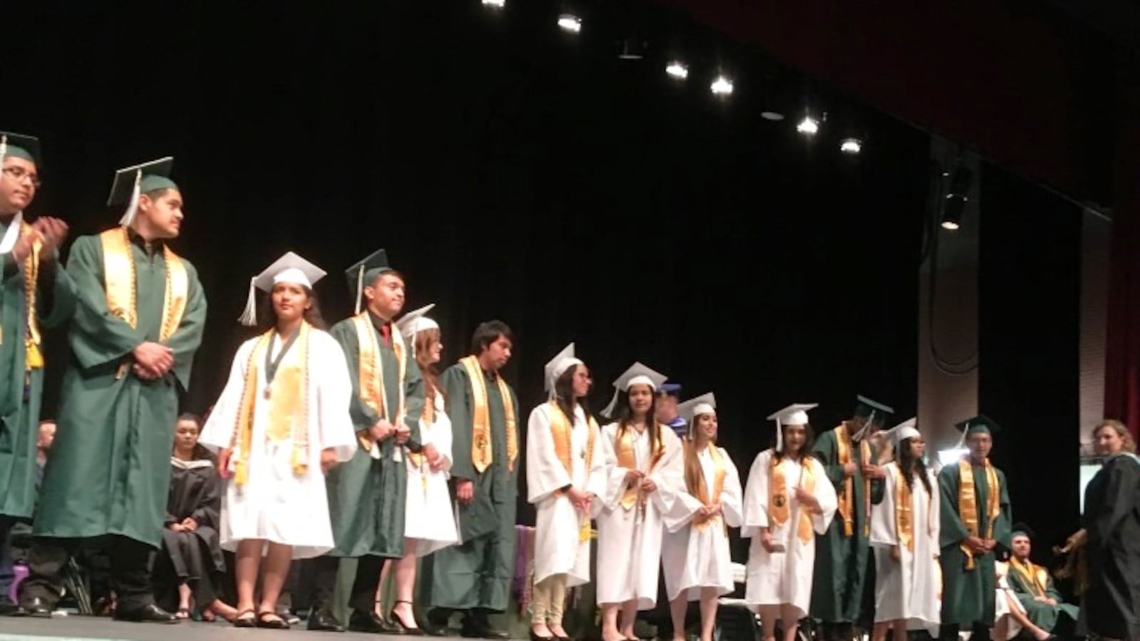 Picture of recipients of the seal of biliteracy at their 2018 graduation from Aurora Central High School. (Photo courtesy of Aurora Public Schools)
