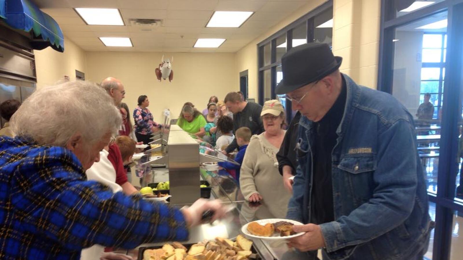 Goodwin seniors serve Tuesday lunch at the center. Next door, Stephen Decatur Elementary School also provides free dinners each week. The program is part of how the district connects with the people and organizations around them.