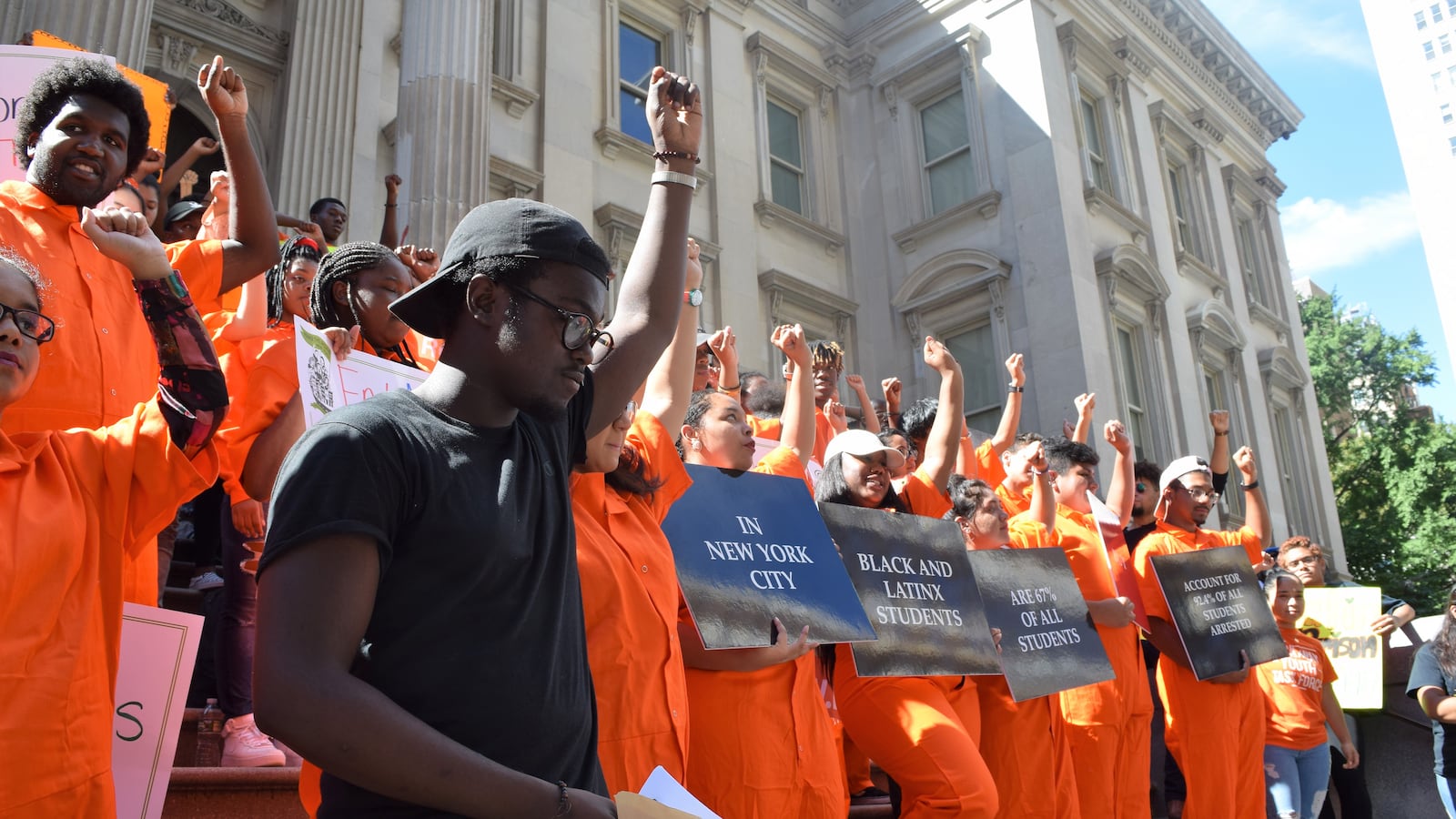 Students and advocates held a rally outside education department headquarters to call for an end to school arrests and summonses.