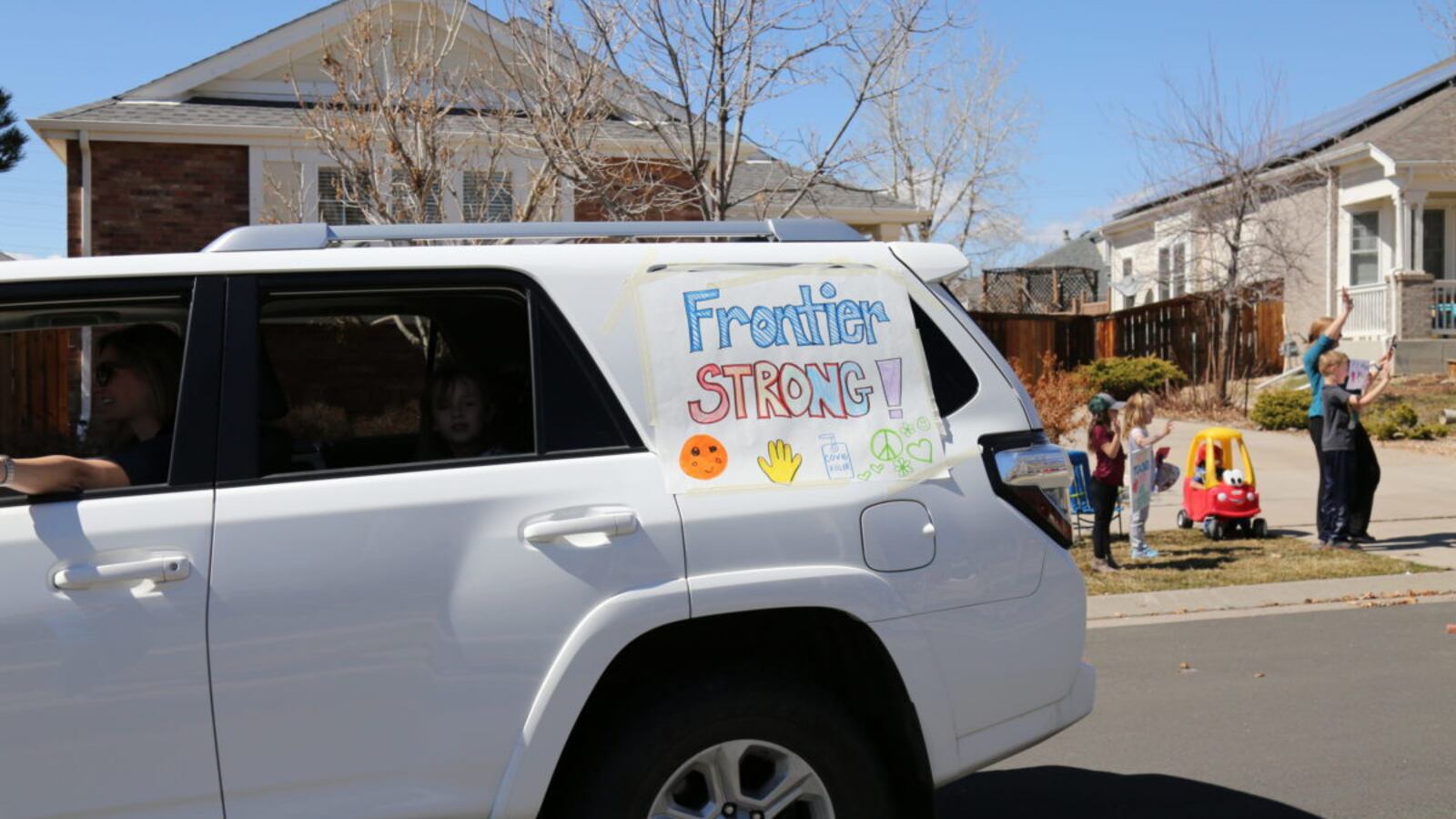 Aurora Frontier P-8 teachers went on a parade route Tuesday March 24, 2020, through their school boundaries to wave to students.