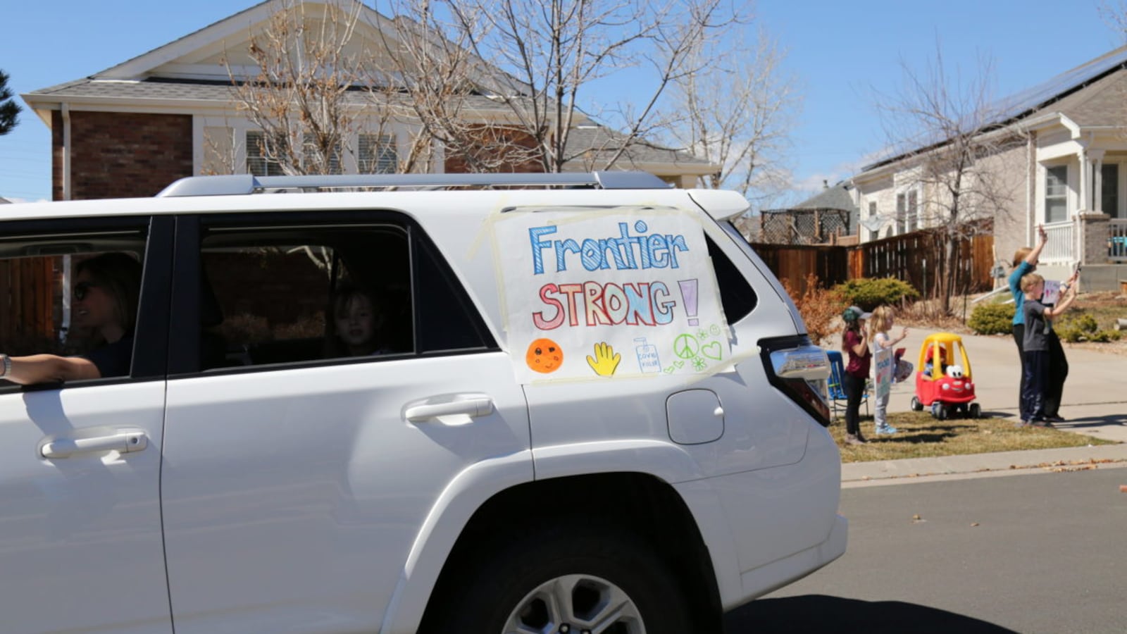 Aurora Frontier P-8 teachers went on a parade route Tuesday March 24, 2020, through their school boundaries to wave to students.