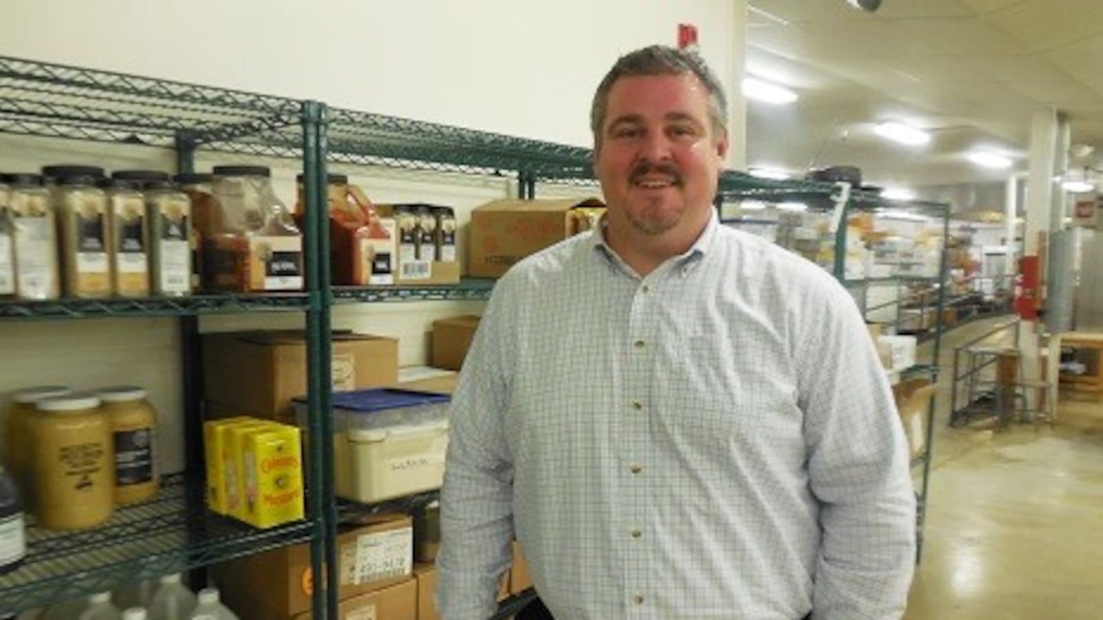 Jeremy West, the nutrition service director of the Weld County 6 School District, stands in his central production kitchen.