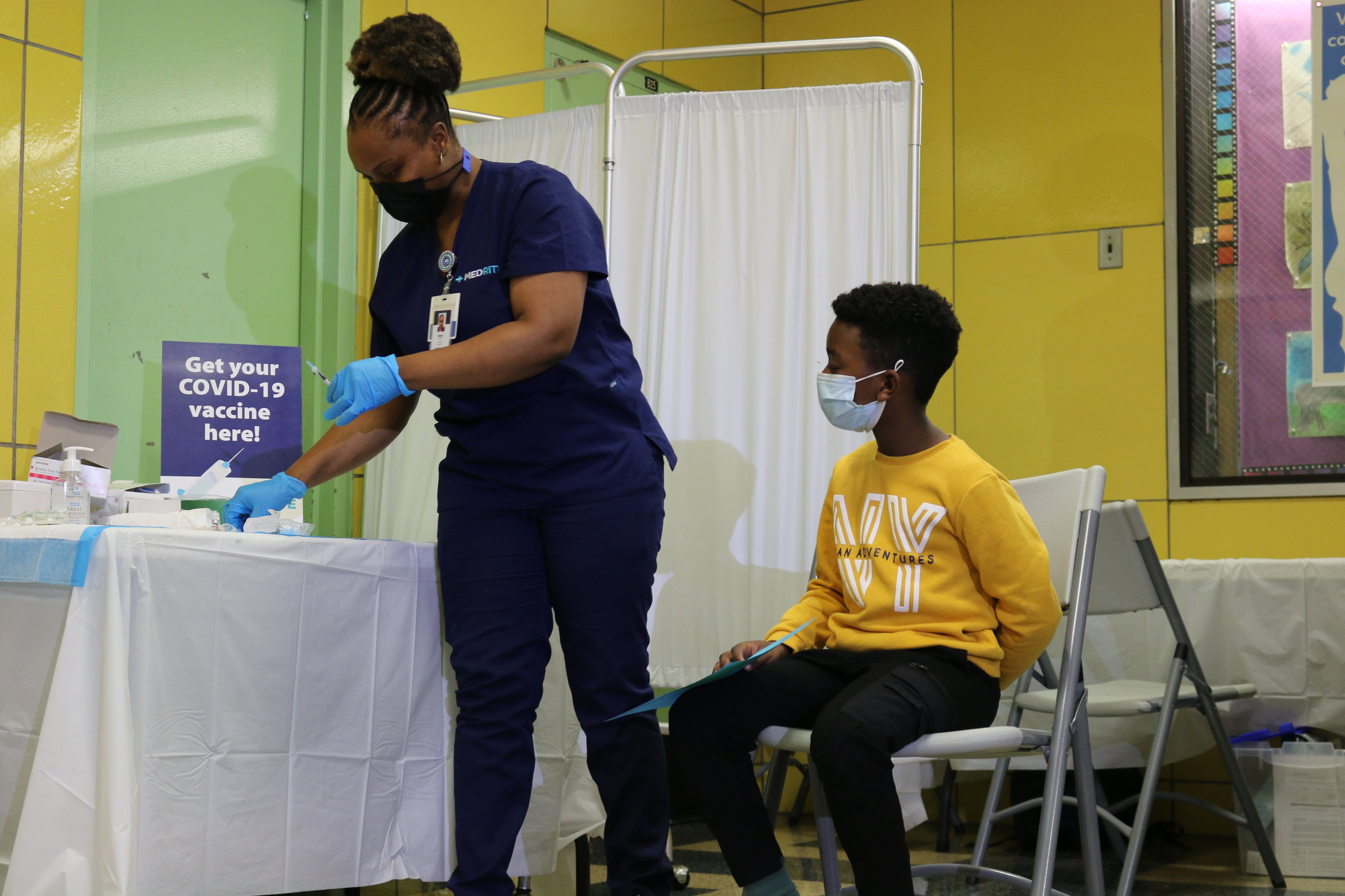 Students at P.S. 19 in Manhattan’s East Village received vaccinations in school on Nov. 8, 2021. The city has not disclosed school vaccination rates, despite a city requirement to do so.