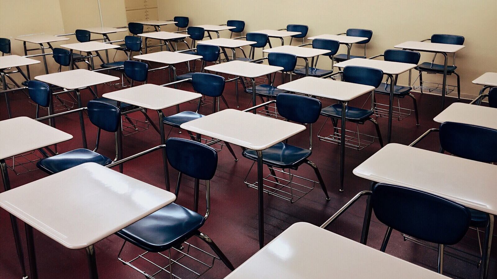 Classroom of empty desks and chairs.
