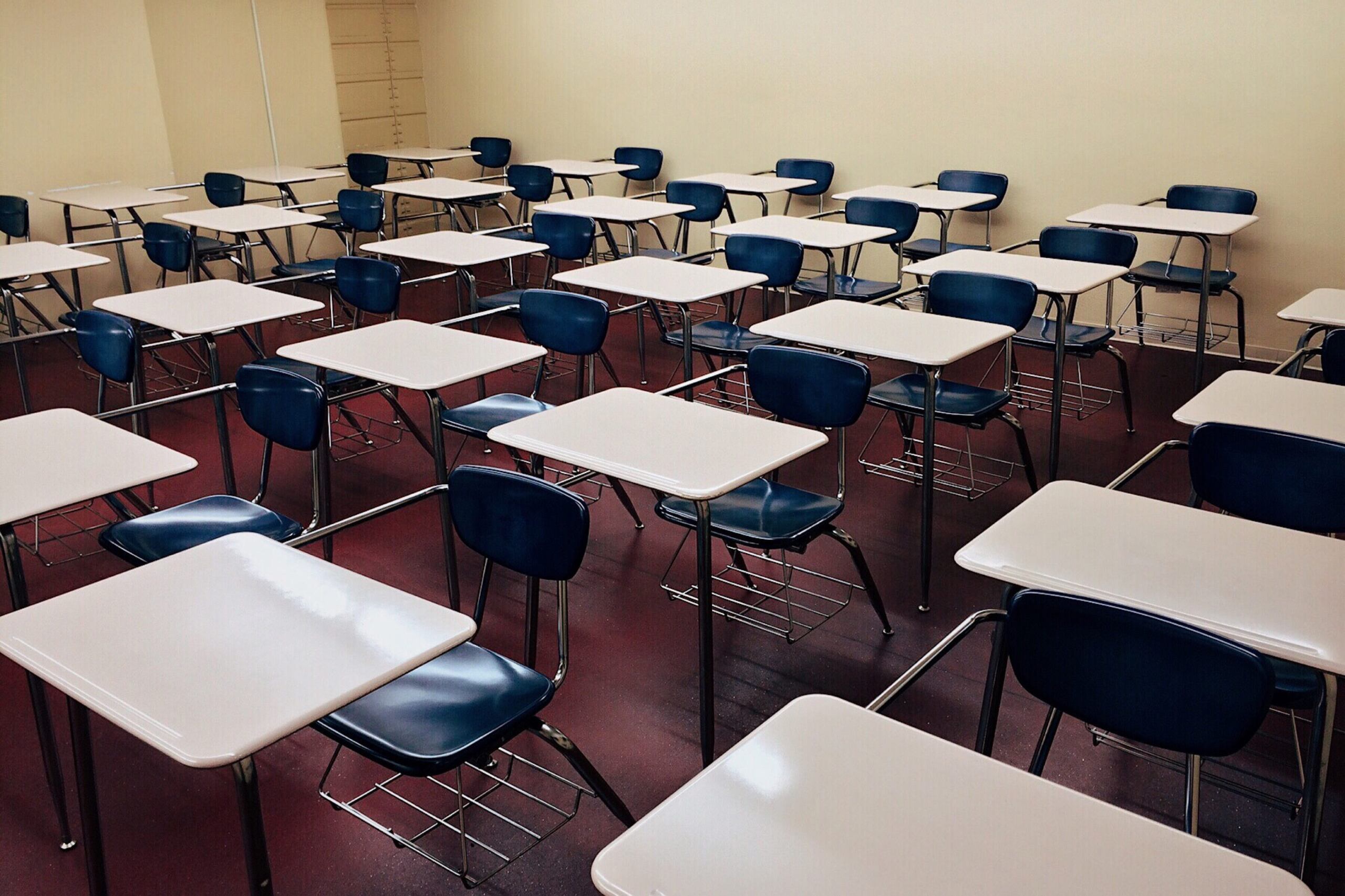 Classroom of empty desks and chairs.