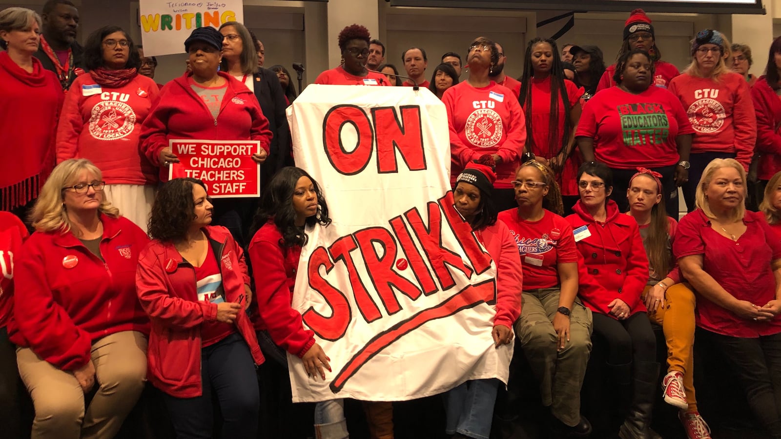 Chicago Teachers Union delegates face news media after voting Oct. 16, 2019, at union headquarters to authorize a strike.