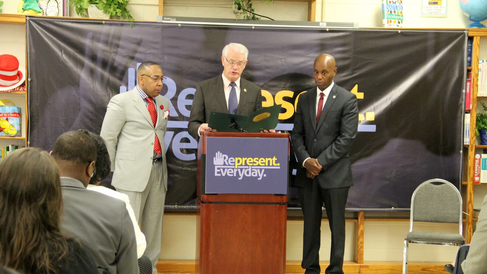 From left: Cherokee Elementary School principal Rodney Rowan, Shelby County Mayor Mark Luttrell and Superintendent Dorsey Hopson speak Wednesday at a press conference in Memphis about initiatives designed to increase student attendance in Shelby County Schools.